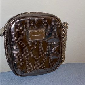 Small Michael Kors silver wristlet